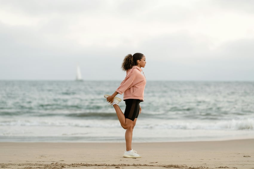 Image of Woman working out on beach