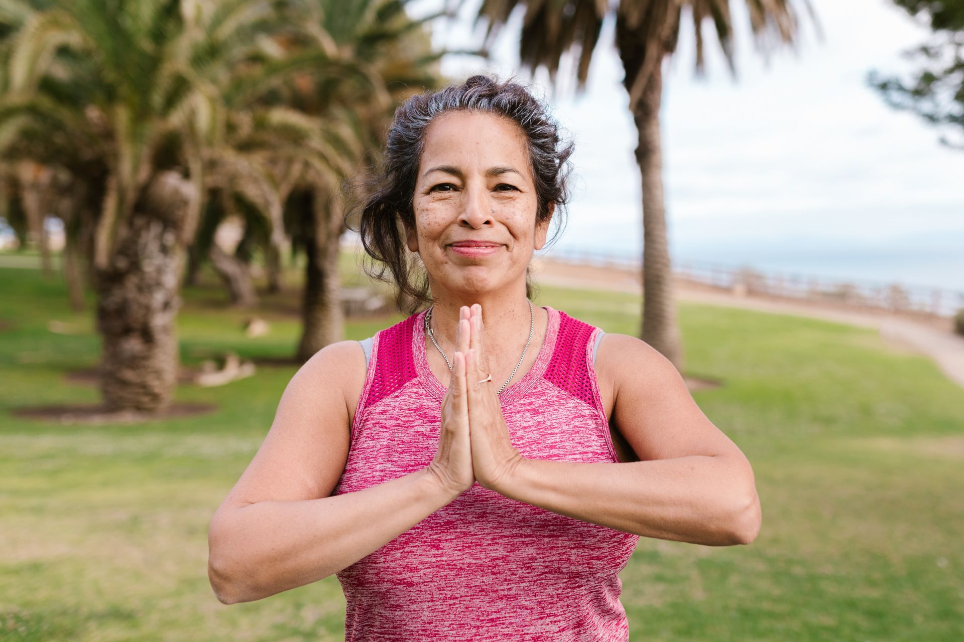 Active woman enjoying morning sun, managing her health through menopause